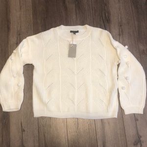 White knitted sweater
